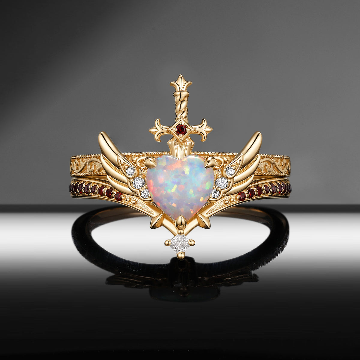 Heart & Sword - Gothic Cabochon Heart Cut Lab Opal Two-Tone Bridal Set with Angel Wing-inspired Band