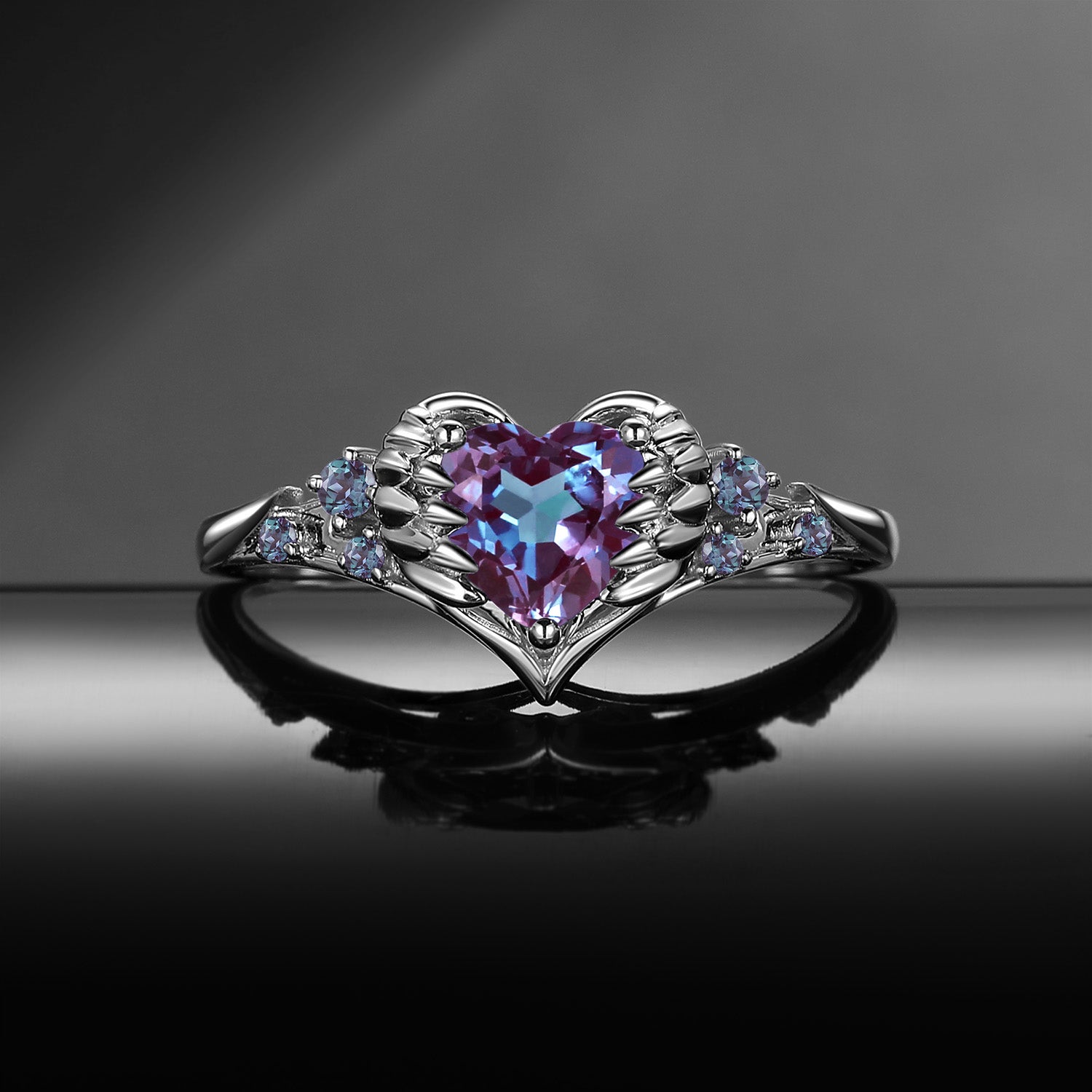 'Pierced Heart' – Gothic Color-Changing Lab Alexandrite Heart & Sword Engagement Ring with Angel Wing Detail