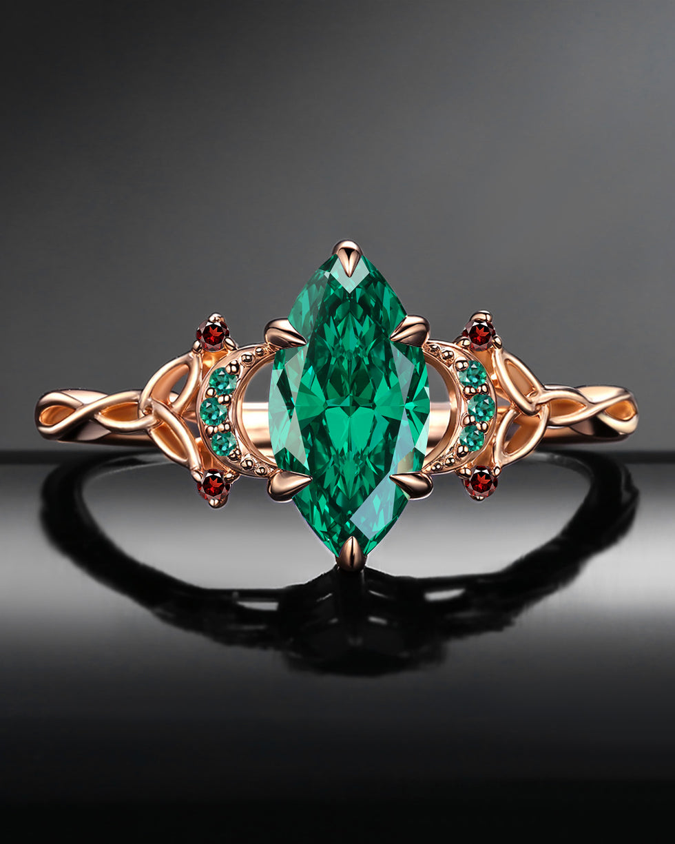 Celtic Moon | Unique Marquise Cut Lab Emerald Twist Engagement Ring