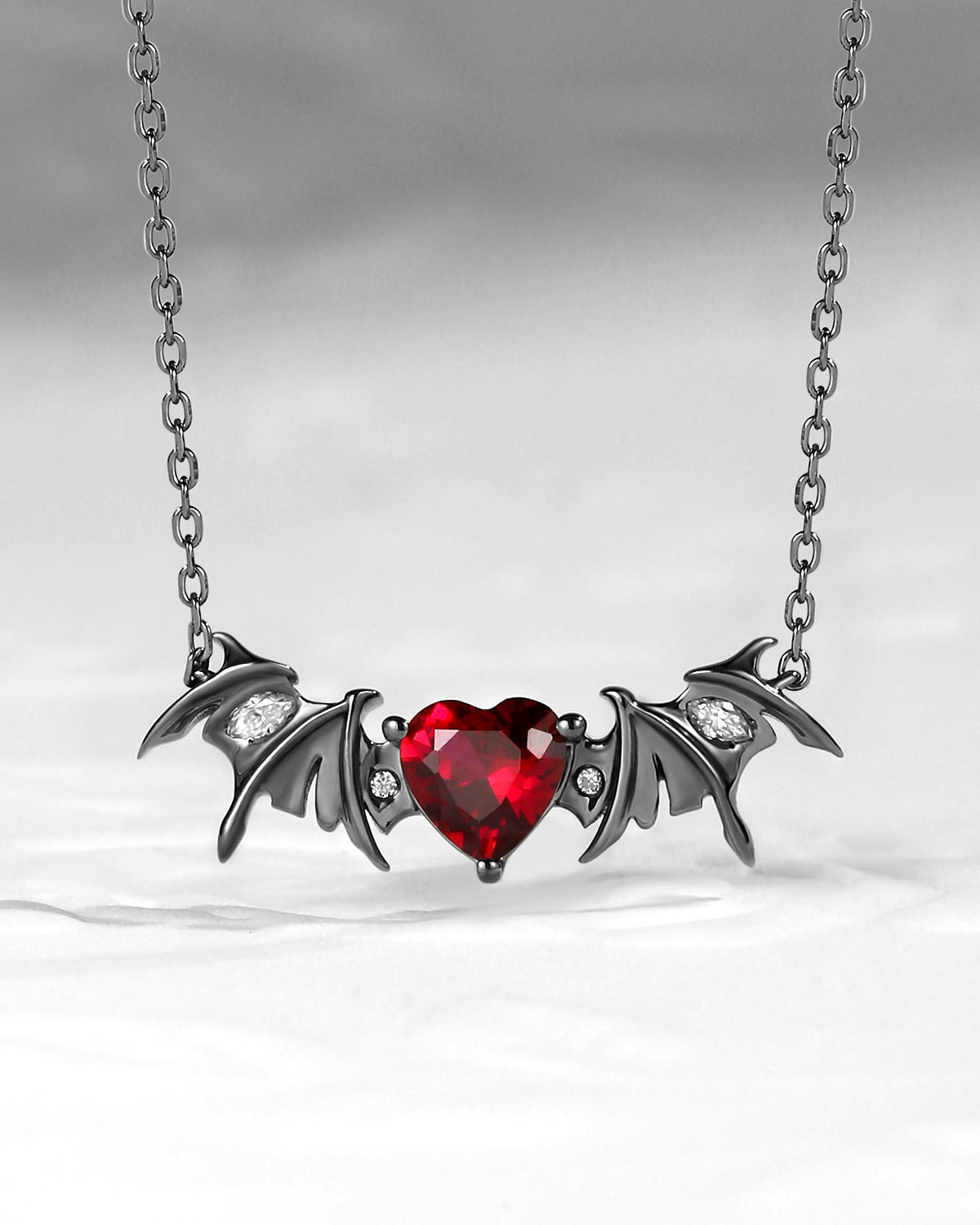 Bat Wing Garnet Heart Cut Necklace