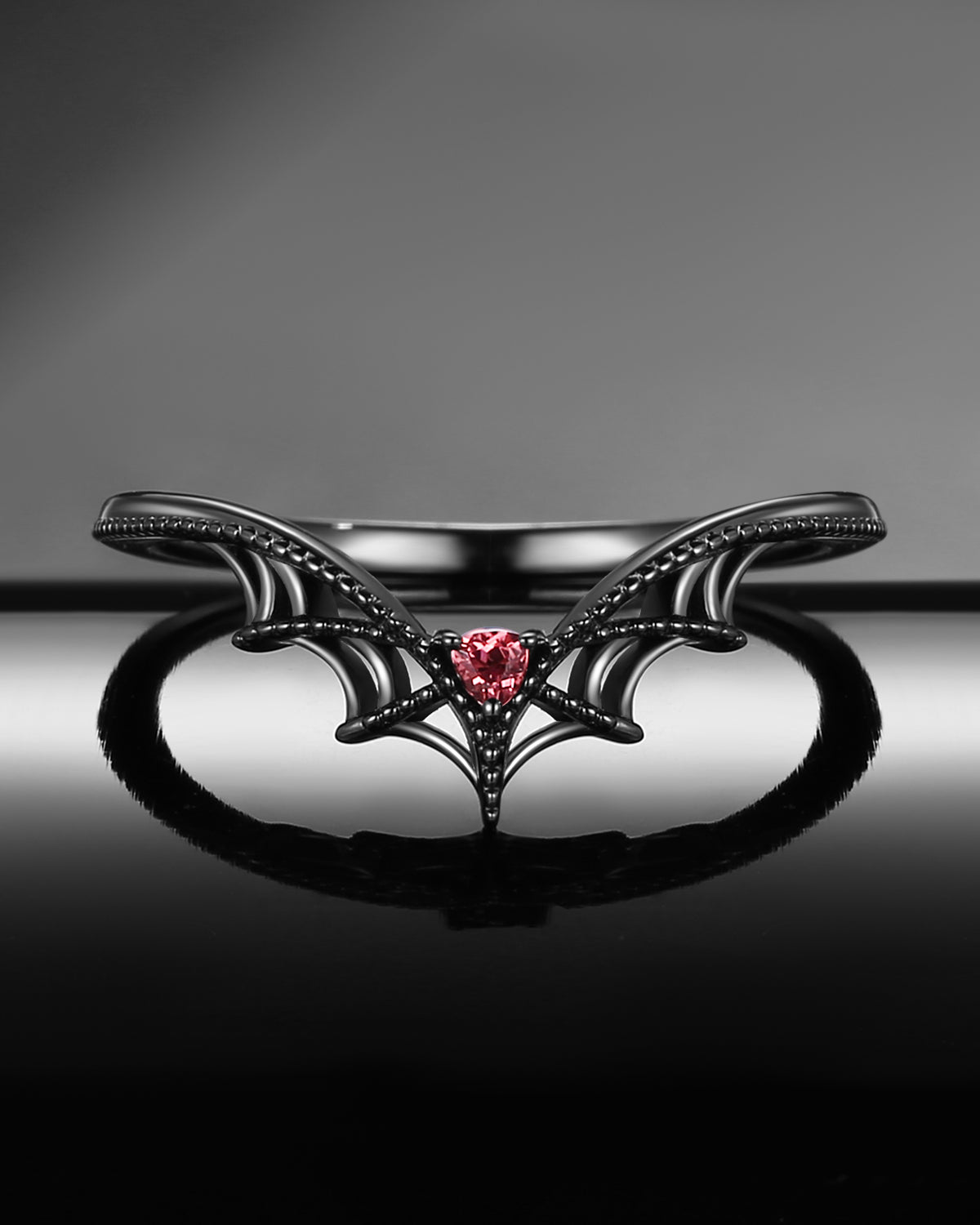 Gothic Style Triangle Cut Garnet Bat Inspired Curved Wedding Band