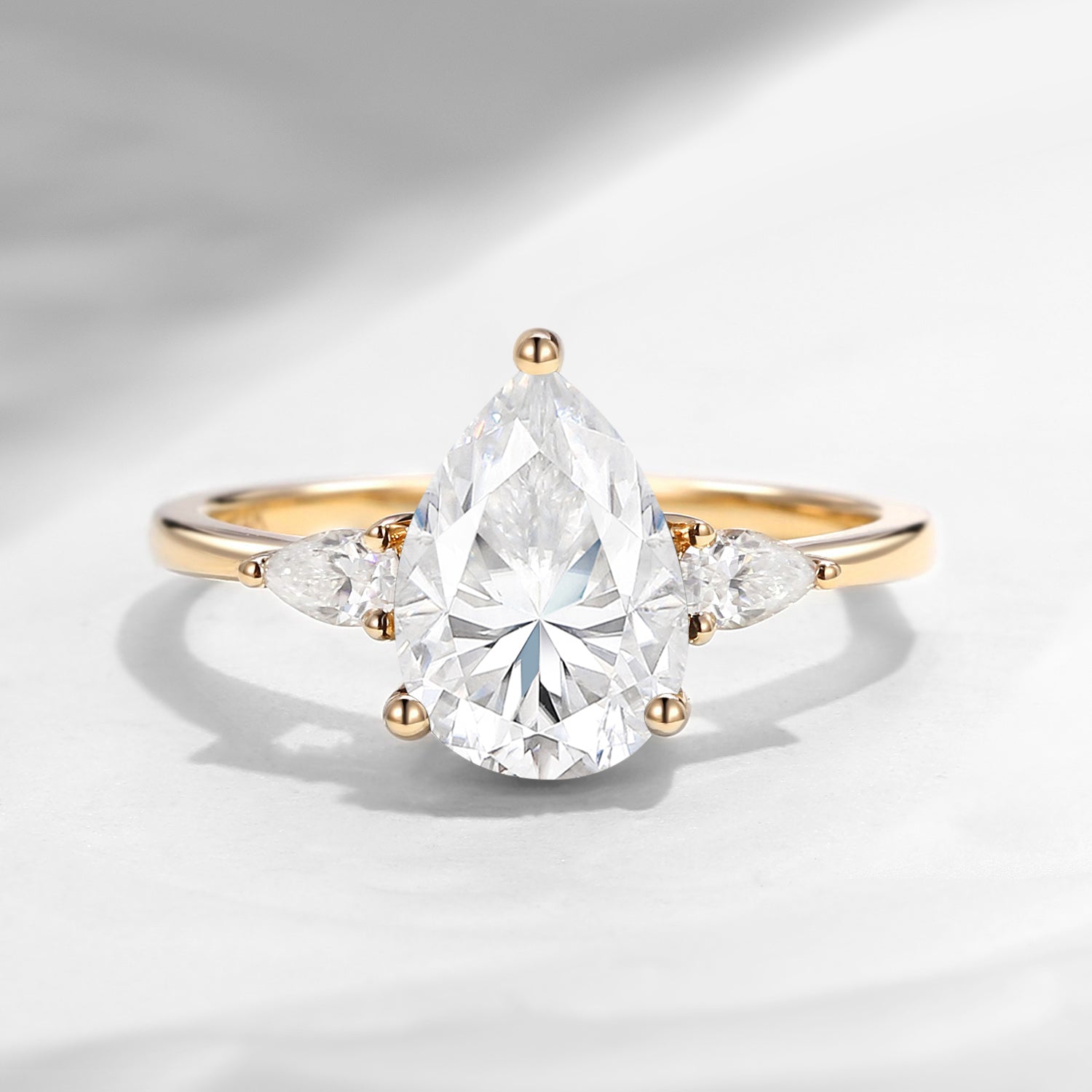 Classic Pear Cut Moissanite Three Stone Engagement Ring