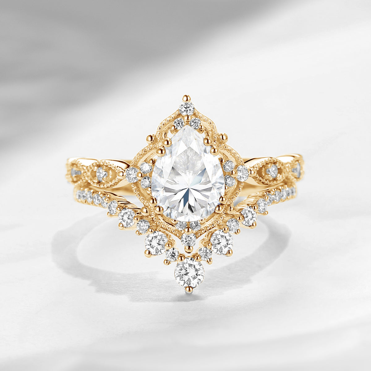 'Elara' - Antique Pear Cut Colorless Moissanite Engagement Ring Set