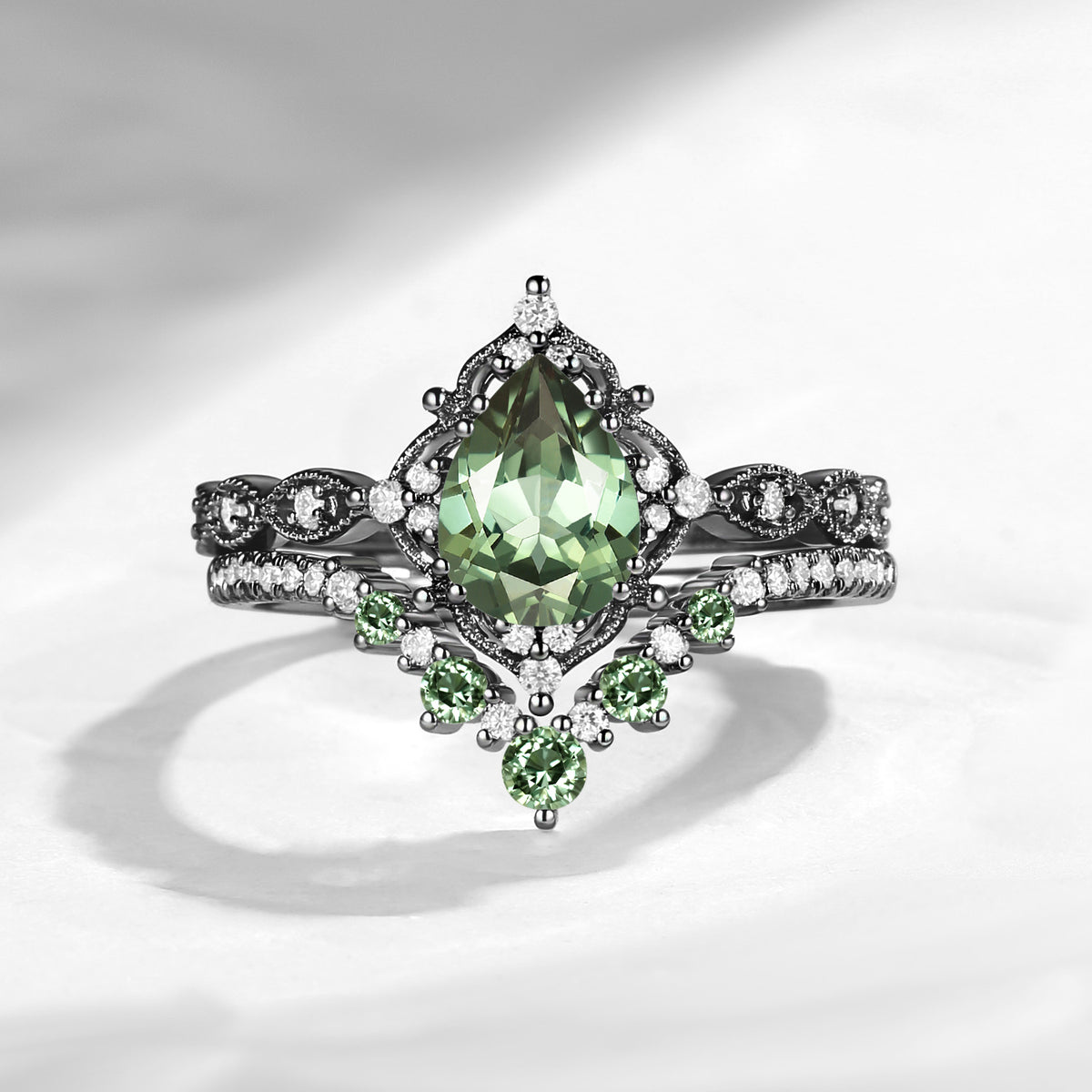 'Elara' - Antique Pear Cut Lab Green Sapphire Engagement Ring Set in Black Gold