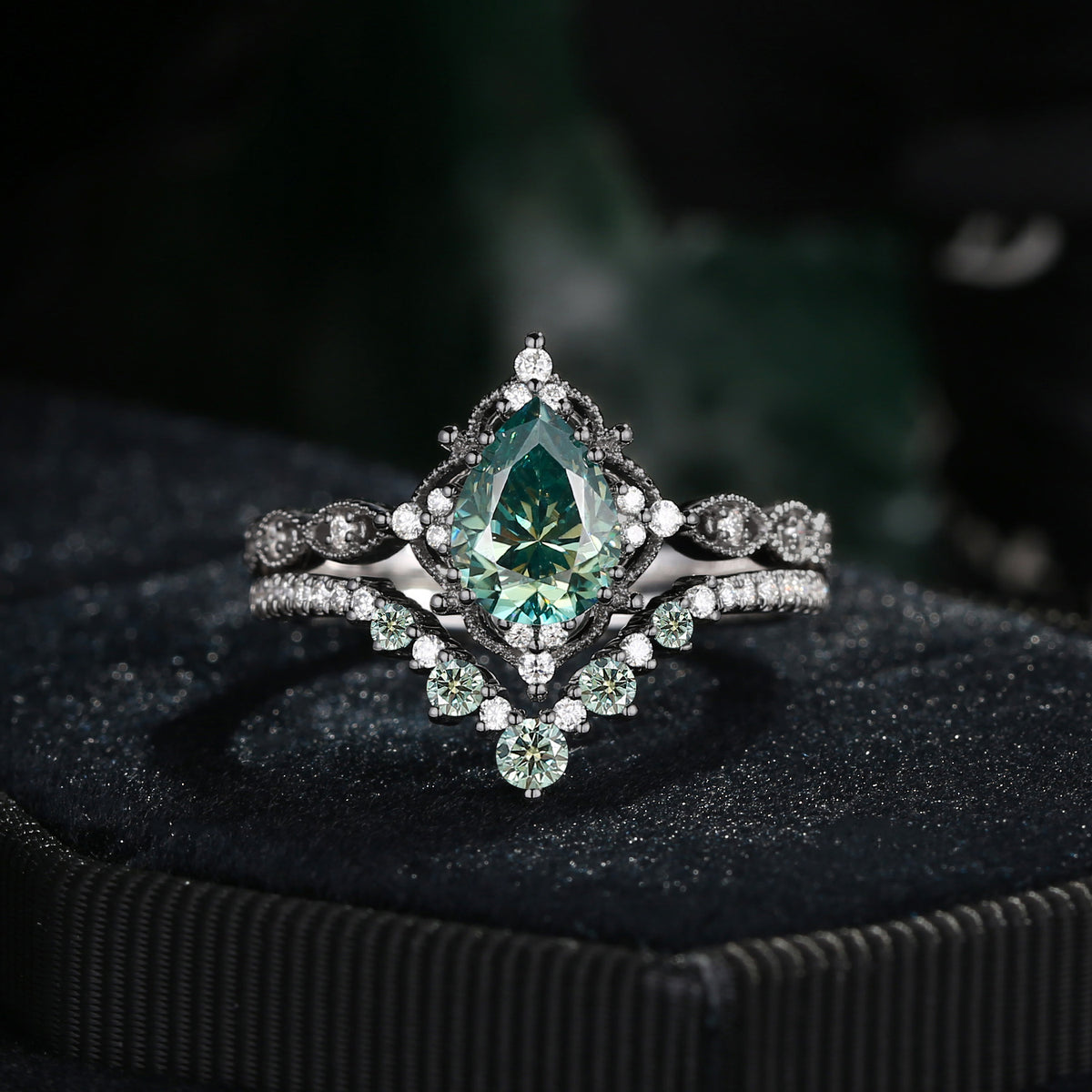 'Elara' - Antique Pear Cut Green Moissanite Engagement Ring Set in Black Gold