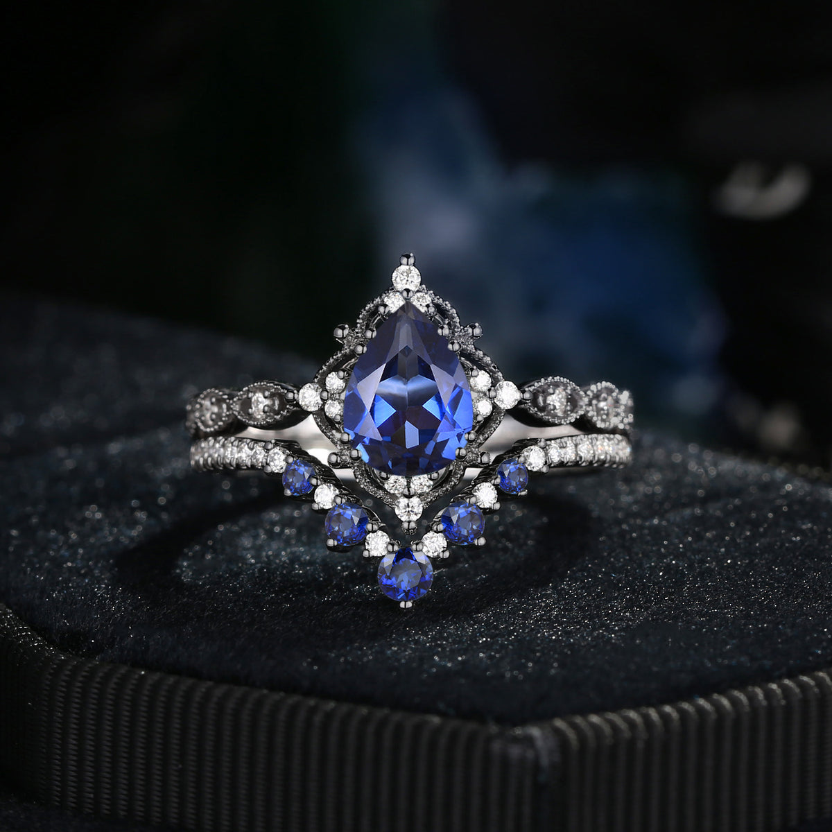 'Elara' - Antique Pear Cut Blue Lab Sapphire Engagement Ring Set in Black Gold