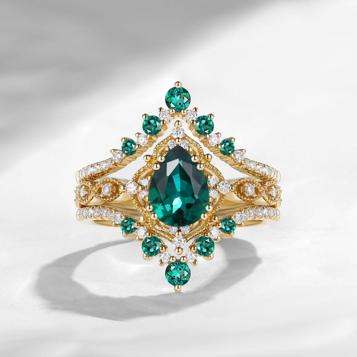 'Elara' - Vintage Pear Cut Lab Emerald Engagement Ring Set with Milgrain Detailing