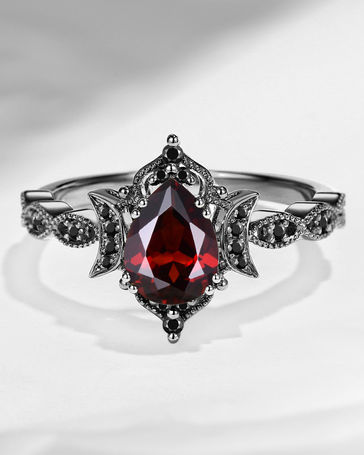 Crescent Moon | Unique Garnet Black Gold Engagement Ring In Pear Shape - Eclipse