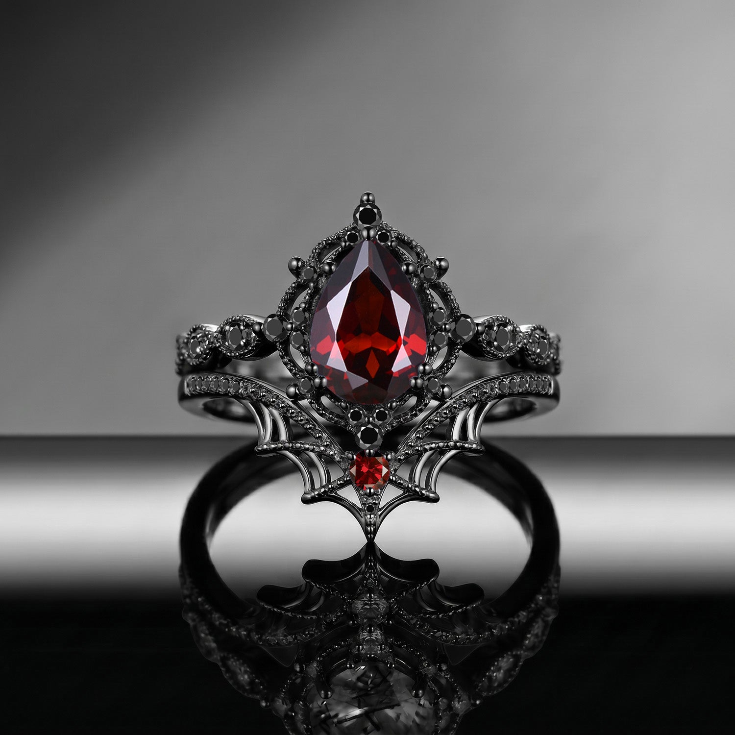 Spider Ring 'Web of Love' – Gothic Pear Cut Garnet Engagement Ring Set with Spider Web Inspired Milgrain Band