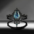 'Bat's Whisper' - Gothic Coffin Natural Teal Sapphire Alternative Bridal Engagement Ring Set with Bat Wings in Black Gold