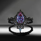 'Bat's Whisper' - Gothic Pear Cut Lab Alexandrite Alternative Bridal Engagement Ring Set with Bat Wings in Black Gold