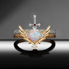 Heart & Sword - Gothic Cabochon Heart Cut Lab Opal Two-Tone Bridal Set with Angel Wing-inspired Band