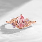 'Moonlit Embrace' - Nature Inspired Pear Lab Pink Sapphire Crescent Moon & Star Engagement Ring with Leaf-inspired Detailing