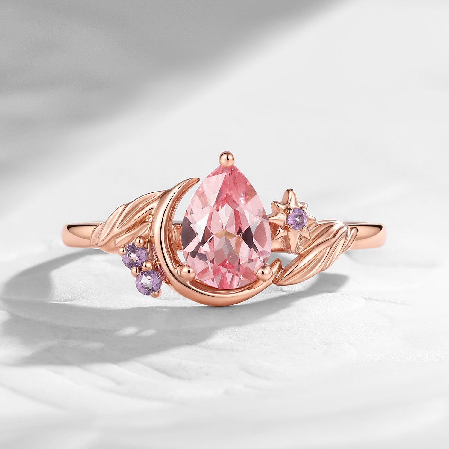 'Moonlit Embrace' - Nature Inspired Pear Lab Pink Sapphire Crescent Moon & Star Engagement Ring with Leaf-inspired Detailing