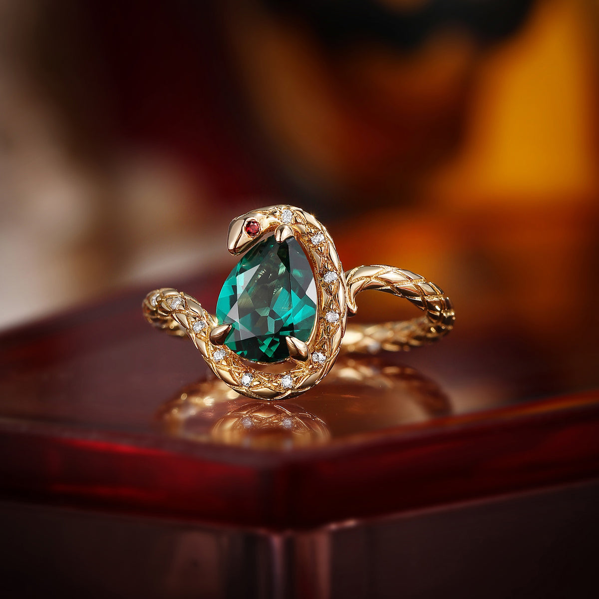 Serpent's Embrace - Gothic Pear Cut Lab Emerald Snake Engagement Ring with Snake-skin Textured Band