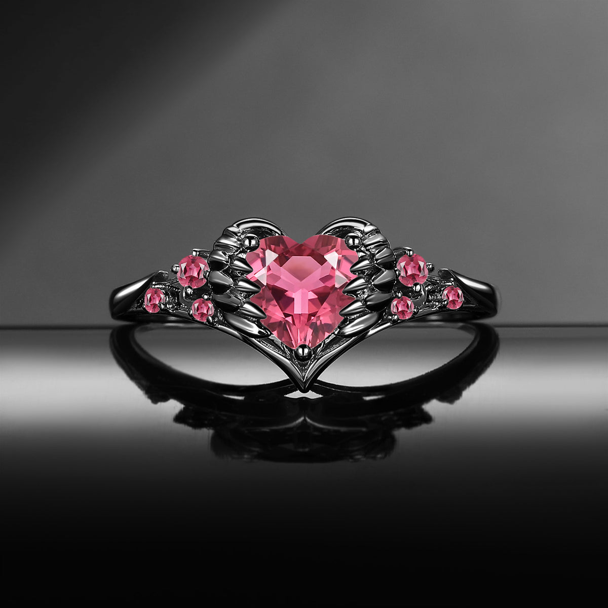 'Pierced Heart' – Gothic Natural Pink Tourmaline Heart & Sword Engagement Ring with Angel Wing Detail
