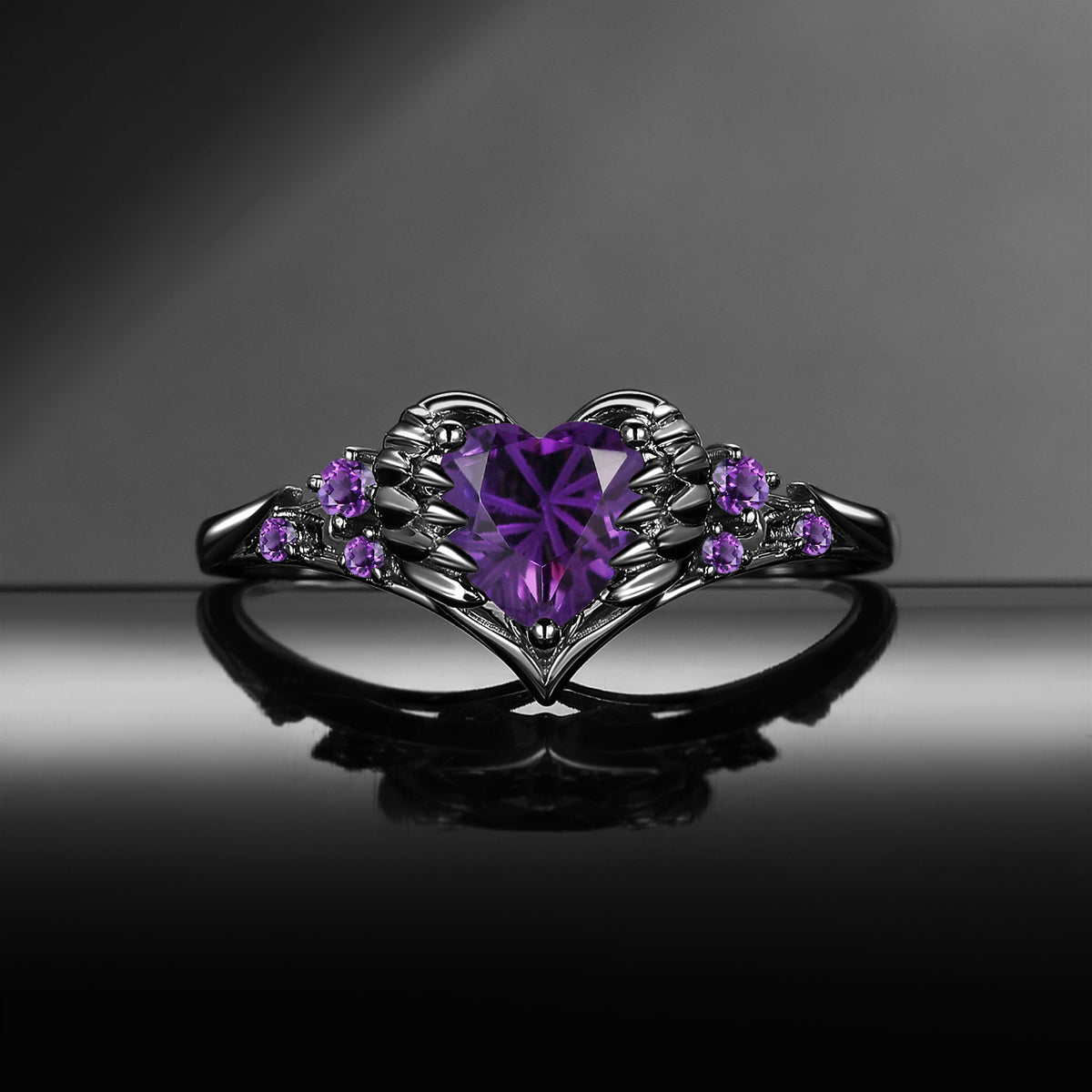 'Pierced Heart' – Gothic Firework Cut Natural Amethyst Heart & Sword Engagement Ring with Angel Wing Detail