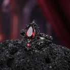 Spider Ring 'Web of Love' – Gothic Pear Cut Garnet Engagement Ring Set with Spider Web Inspired Milgrain Band