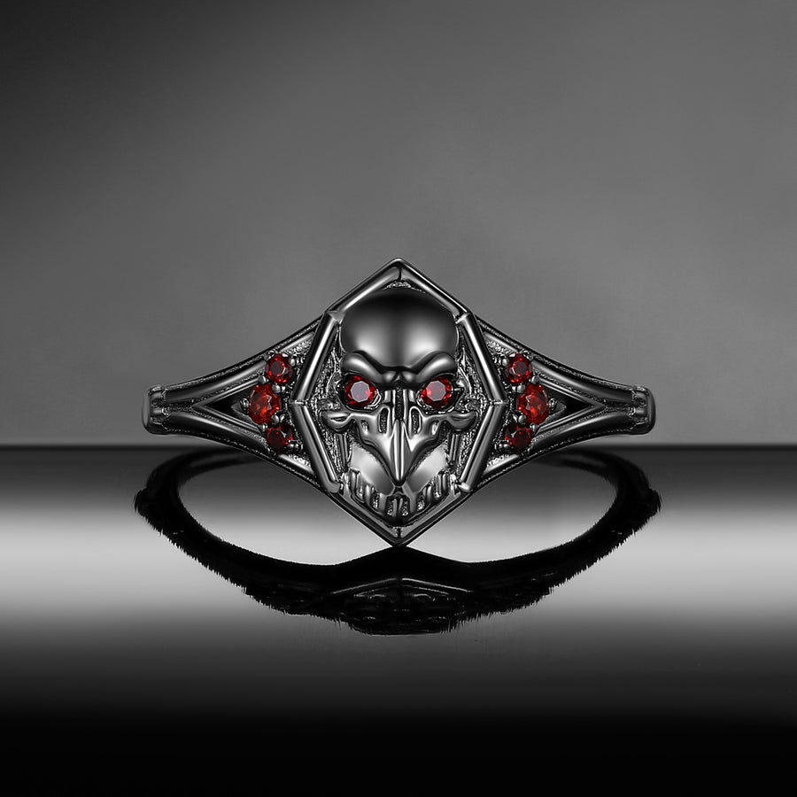 Gothic crow inspired garnet black gold engagement ring
