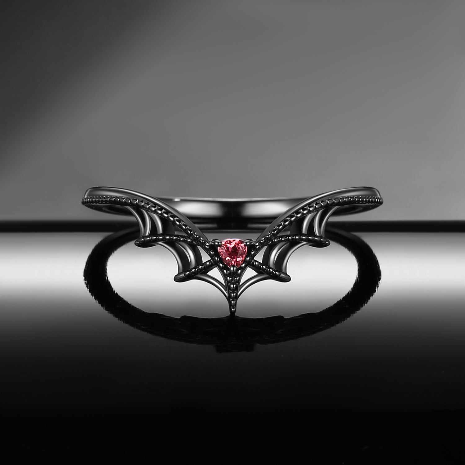 Gothic Style Triangle Cut Garnet Bat Inspired Curved Wedding Band