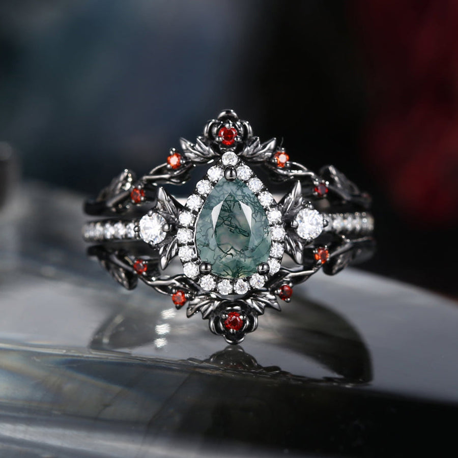 Gothic pear cut moss agate thorns and roses engagement ring