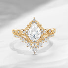 'Elara' - Antique Pear Cut Colorless Moissanite Engagement Ring Set
