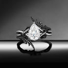 Thorns & Roses - 18K Gothic Pear Cut Moissanite Two-Tone Cage Ring Set with Thorn-Inspired Band