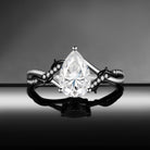 Thorns & Roses - Nature Inspired Pear Moissanite Two-Tone Engagement Ring with Twisted Vine Band