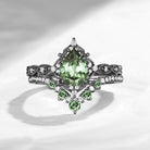 'Elara' - Antique Pear Cut Lab Green Sapphire Engagement Ring Set in Black Gold