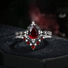 'Elara' - Antique Pear Cut Natural Garnet Engagement Ring Set in Black Gold