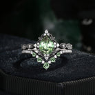 'Elara' - Antique Pear Cut Lab Green Sapphire Engagement Ring Set in Black Gold