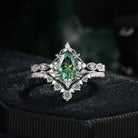'Elara' - Antique Firework Cut Pear Green Moissanite Engagement Ring Set