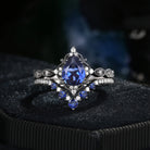 'Elara' - Antique Pear Cut Blue Lab Sapphire Engagement Ring Set in Black Gold