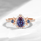 Thorns & Roses - Nature Inspired Pear Lab Alexandrite Halo Engagement Ring with Half Eternity Band