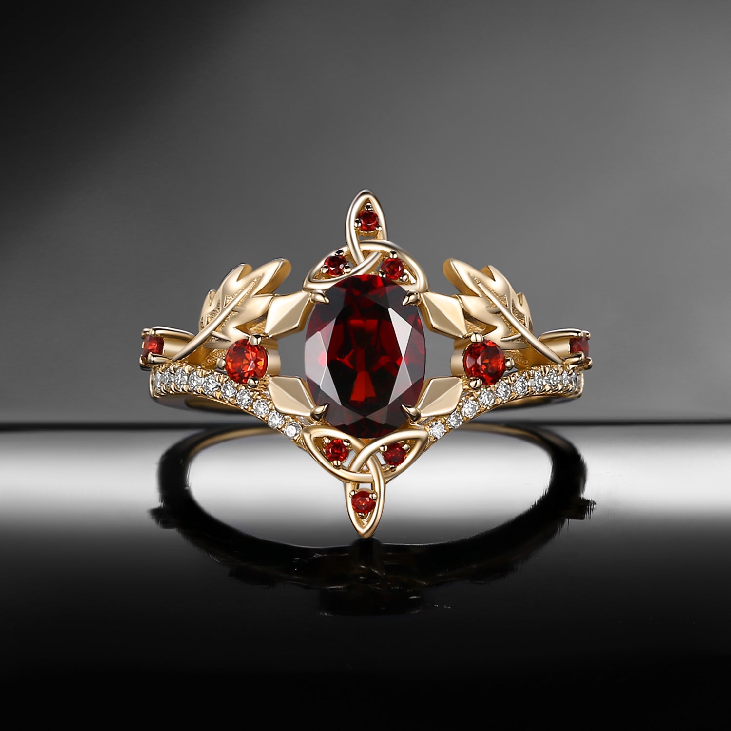 Celtic Calendar | 12.24-1.20 | Oval Garnet Nature Inspired Birch Leafy Celtic Ring