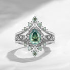 'Elara' - Vintage Pear Cut Green Moissanite Engagement Ring Set with Milgrain Detailing