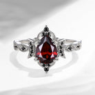 Unique Garnet Engagement Ring In Pear Shape