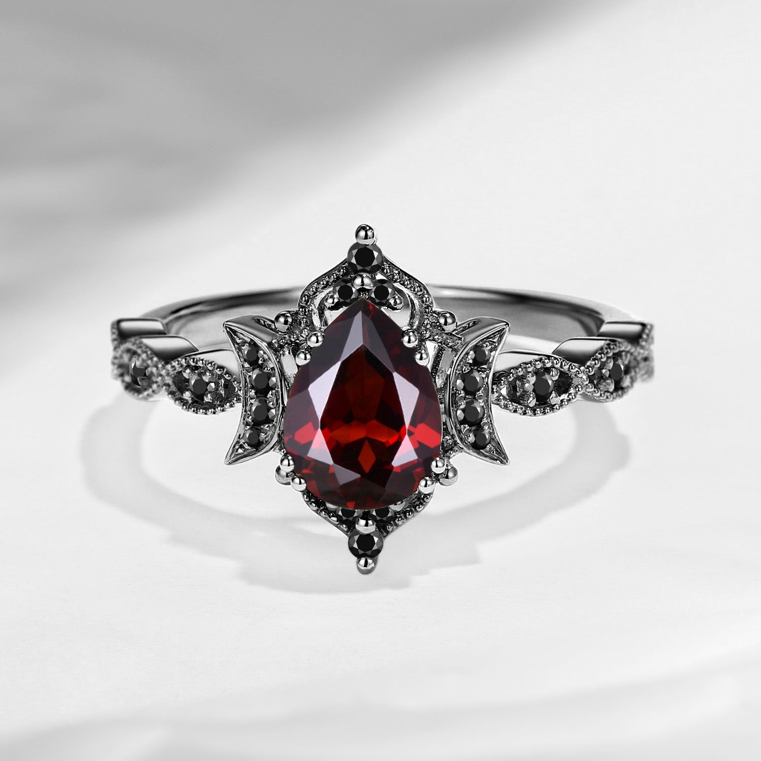 Crescent Moon | Unique Garnet Black Gold Engagement Ring In Pear Shape - Eclipse