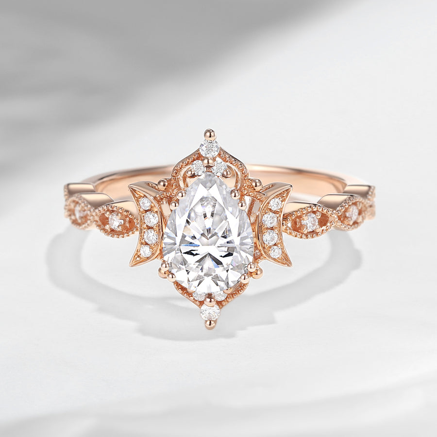 Crescent moon pear shaped lab diamond engagement ring