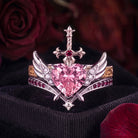 Heart & Sword - Gothic Heart Cut Lab Pink Sapphire Two-Tone Bridal Set with Angel Wing-inspired Band